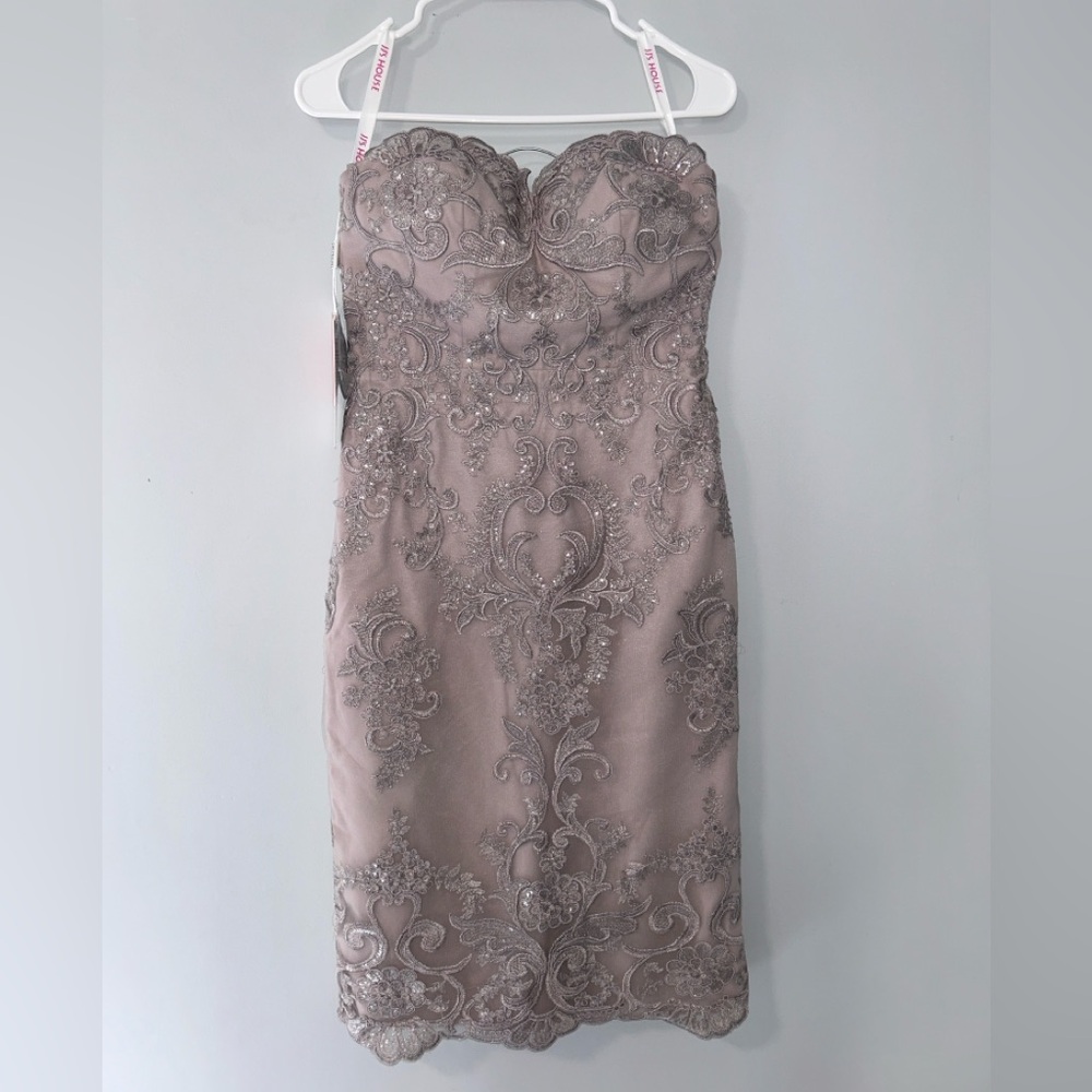 Beautiful sweetheart neckline, sequin dress. Bought for “mother of the bride”